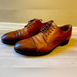 GUCCI Men's lace-up shoe with brogue details 
Made in Italy